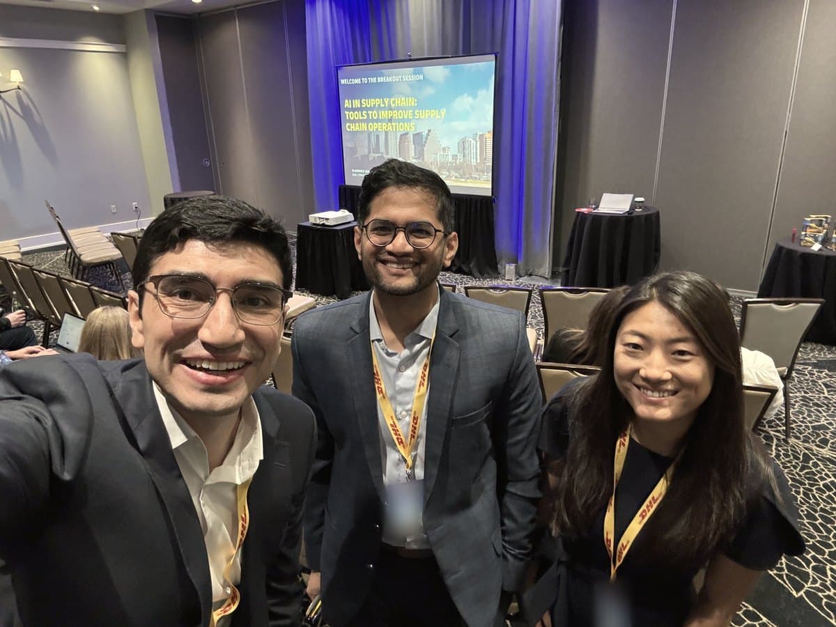 David Herrera with two colleagues before their talk at a supply chain conference
